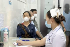 People waiting to see doctors for pink eye at Ho Chi Minh City Eye Hospital. (Photo: VNA)