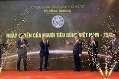 The Vietnam Consumer Rights Day 2025 is under the theme "Transparent Information – Responsible Consumption". (Photo: VNA)