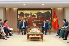 Prime Minister Pham Minh Chinh receives Wouter Van Wersch, Executive Vice President of Airbus International. (Photo: VNA)