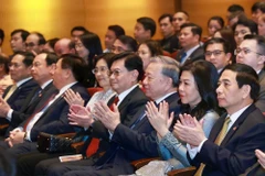 From right: Party General Secretary To Lam (3rd) and his spouse, Ngo Phuong Ly (2nd), at a special concert at the Concert Hall of the Yong Siew Toh Conservatory of Music. (Photo: VNA)