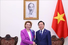 Deputy Prime Minister Tran Hong Ha (R) and Vice-President of EIB Nicola Beer at their meeting in Hanoi on March 13 (Photo: VNA)