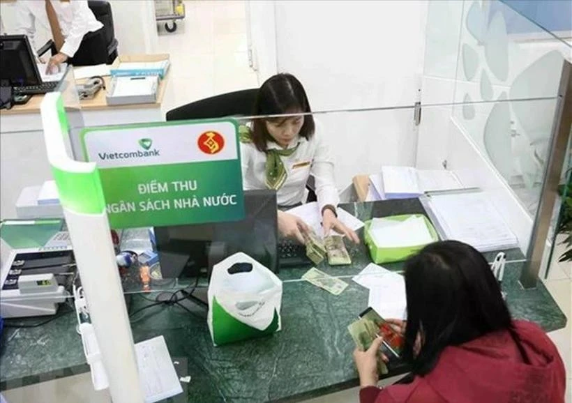 Vietnam’s state budget revenue reaches 574.4 trillion VND (22.5 billion USD) as of March 11. (Photo: VNA)