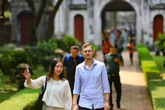 Foreign tourists visit Temple of Literature in Hanoi (Photo: VNA)