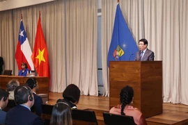 Vietnamese State President Luong Cuong delivers a policy speech at the University of Chile on November 12. (Photo: VNA)