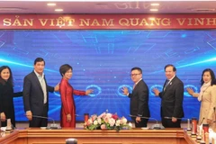 At the launching ceremony of the second Photo and Video Award “Technology with heart” in Hanoi on February 26 (Photo: VNA)