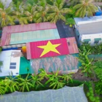 People transform roof into a national flag to celebrate National Day