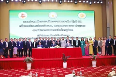 Participants in the workshop held in Vientiane on September 25 (Photo: VNA)