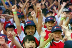 Vietnamese students from preschool to high school enjoy tuition-free education (Photo: VNA)